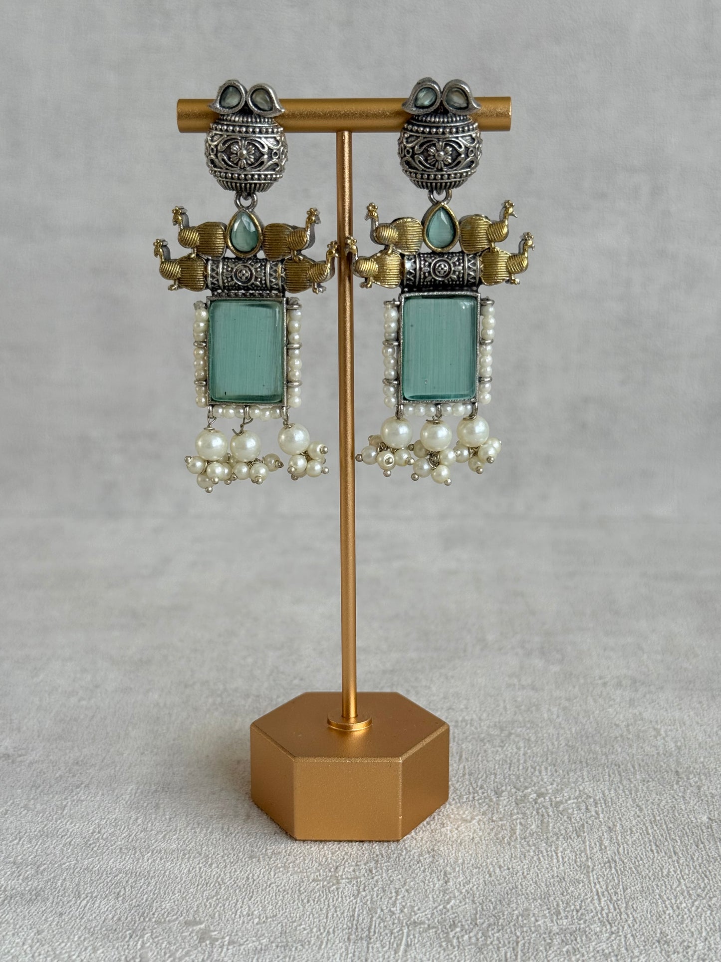 Ayura Designs Khaak Earrings – Oxidised Statement Earrings with Peacock Motifs, Aqua Green Stones & Pearl Clusters
