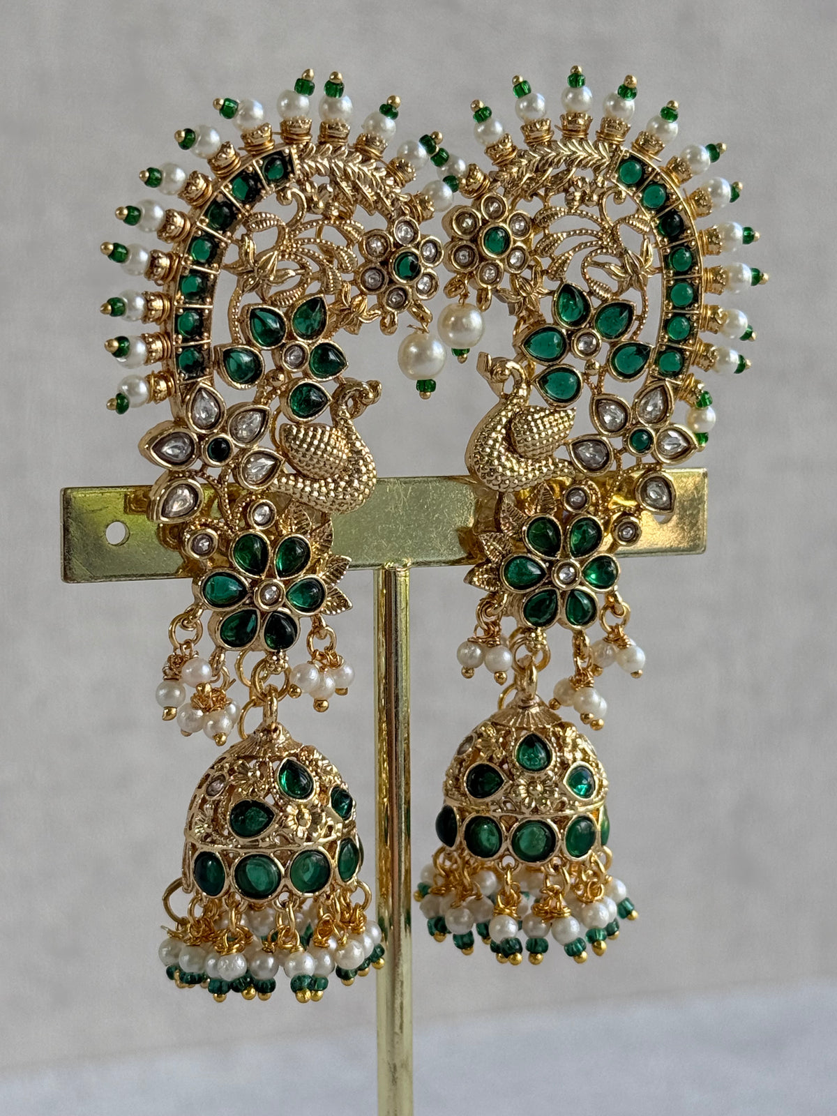 Ayura Designs Nitya Kaanphool Jhumkis – Gold Peacock Motifs, Emerald Green Kundan & Pearl Drops with Attached Sahare