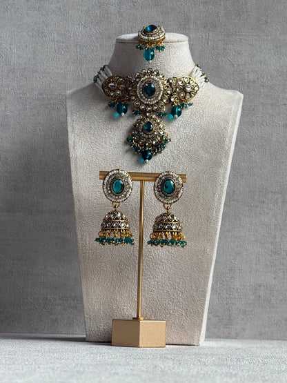 Ayura Designs Muskaan Set – Choker, Jhumkis & Tikka with Peacock Blue Beads, Kundan Stones & Antique Gold Finish