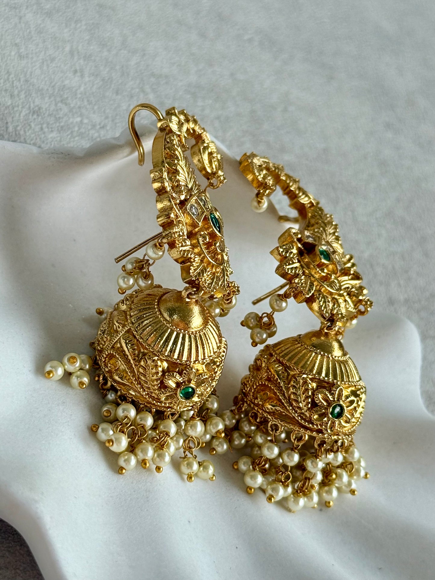 Ayura Designs Anika Jhumkis – Gold Half Ear Cuffs with Peacock Motif, Green Stone Accents, Kundan Crystals & Pearl Jhumka Drops
