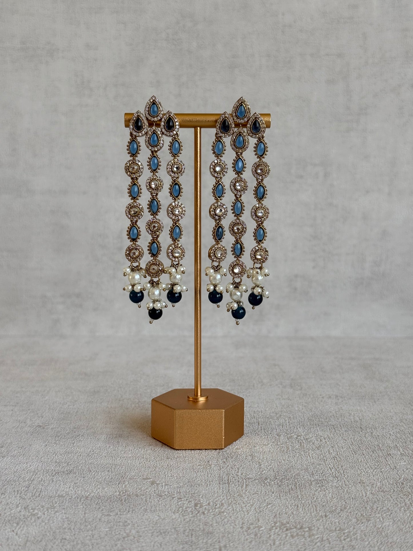 Ayura Designs Emilia Earrings – Gold Triple Strand Statement Earrings with Ink Blue Stones & Pearl Drops
