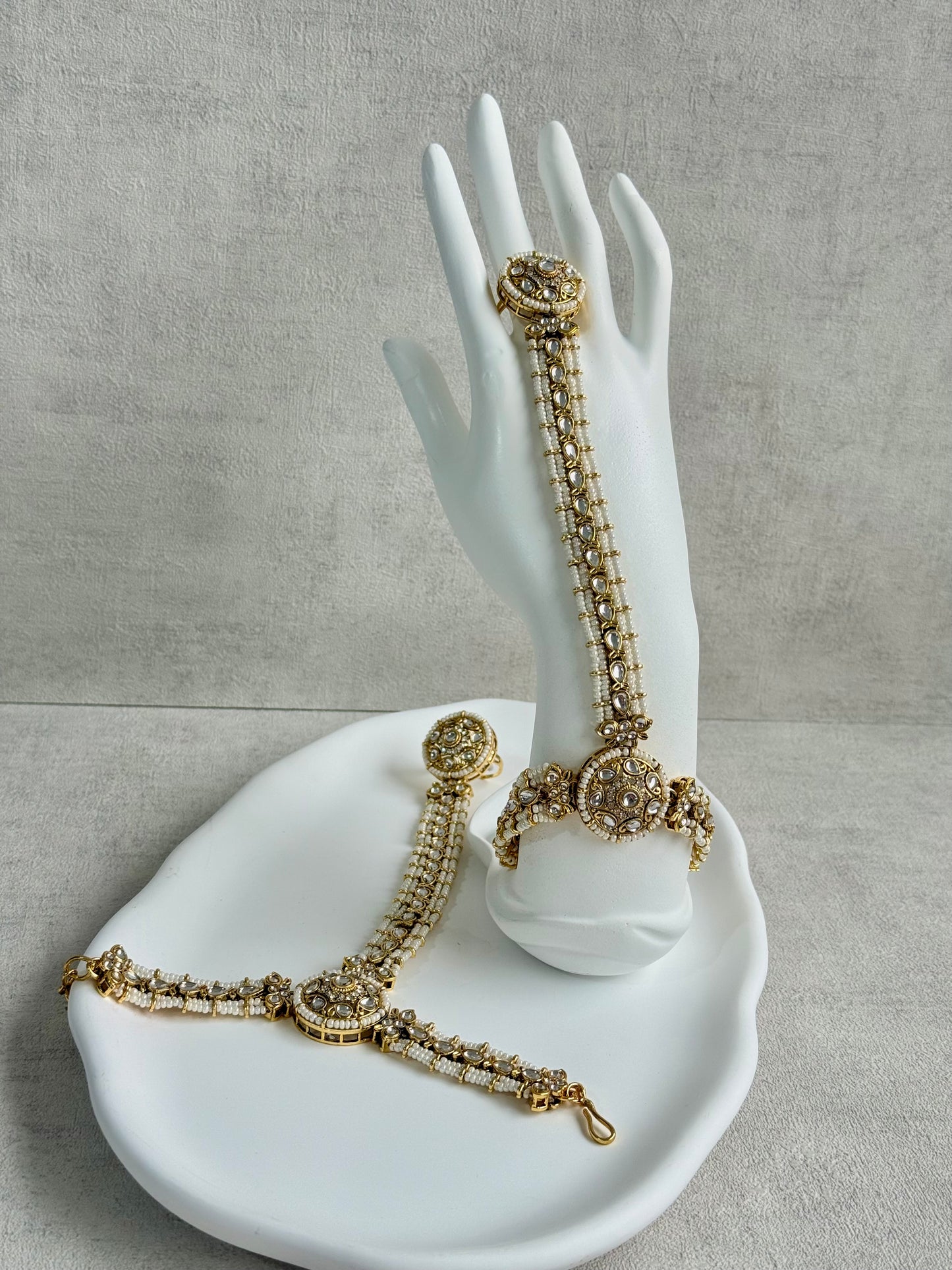 Ayura Designs Mirana Haathphool – Kundan Hand Harness with Pearl Detailing in Antique Gold Finish