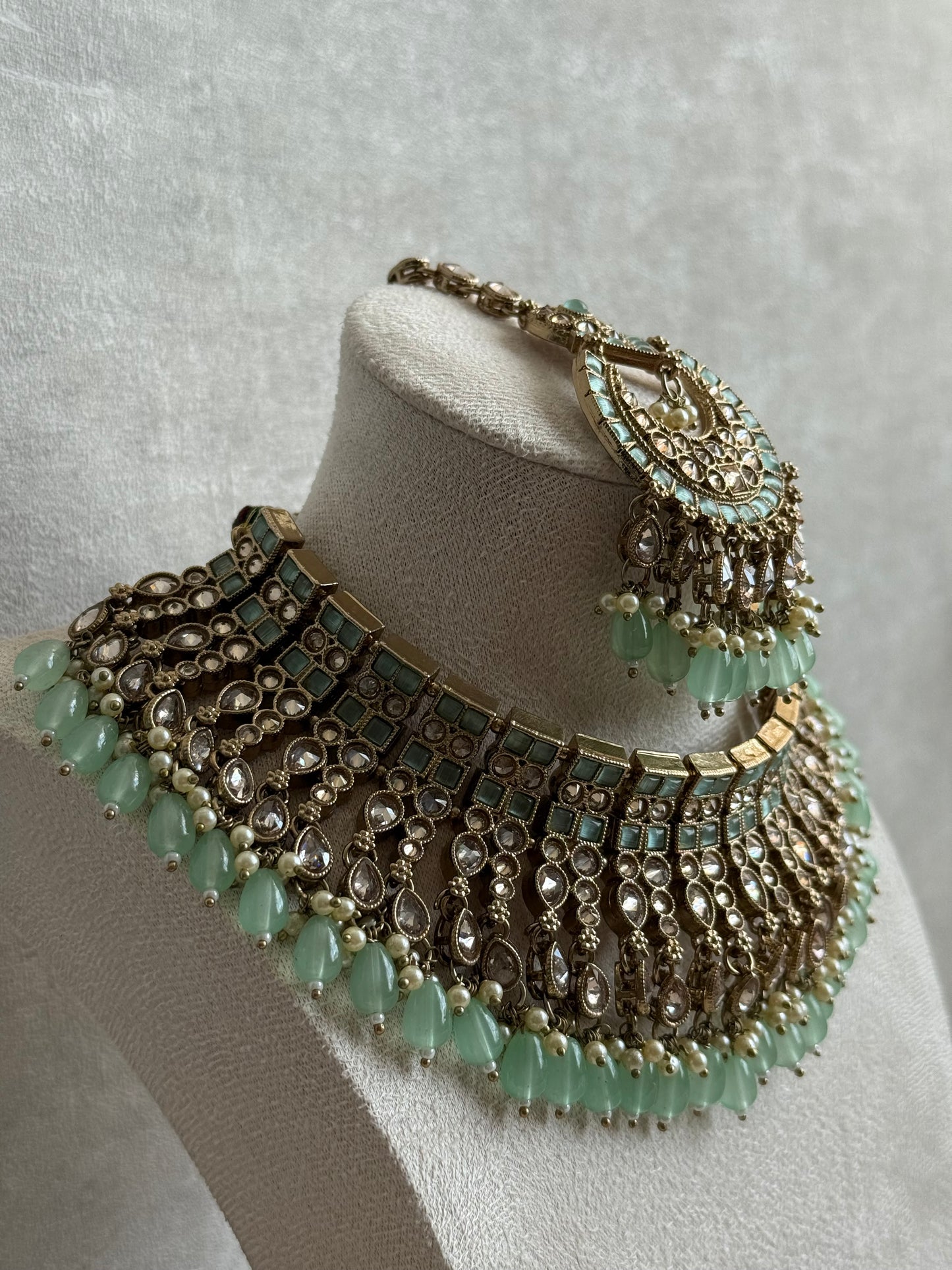 Ayura Designs Sajda Bridal Set with Necklace, Earrings, Tikka & Passa – Pistachio Green Beads, Kundan & Mirror-Cut Detailing