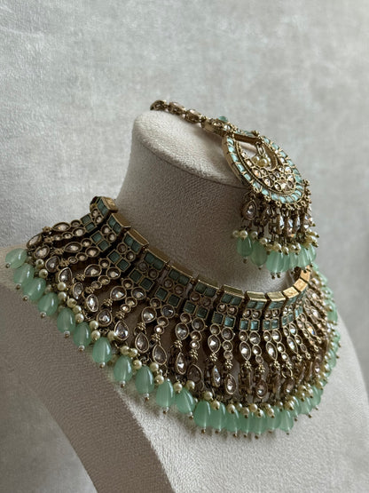 Ayura Designs Sajda Bridal Set with Necklace, Earrings, Tikka & Passa – Pistachio Green Beads, Kundan & Mirror-Cut Detailing