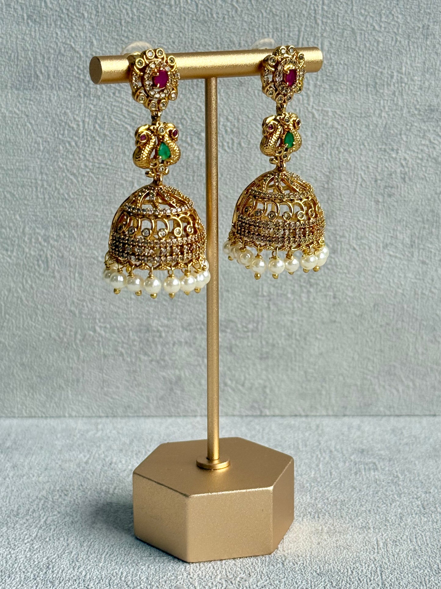 Ayura Designs Darya Jhumkis – Gold Peacock Motif Jhumkis with Ruby Pink, Emerald Green and Pearl Detailing