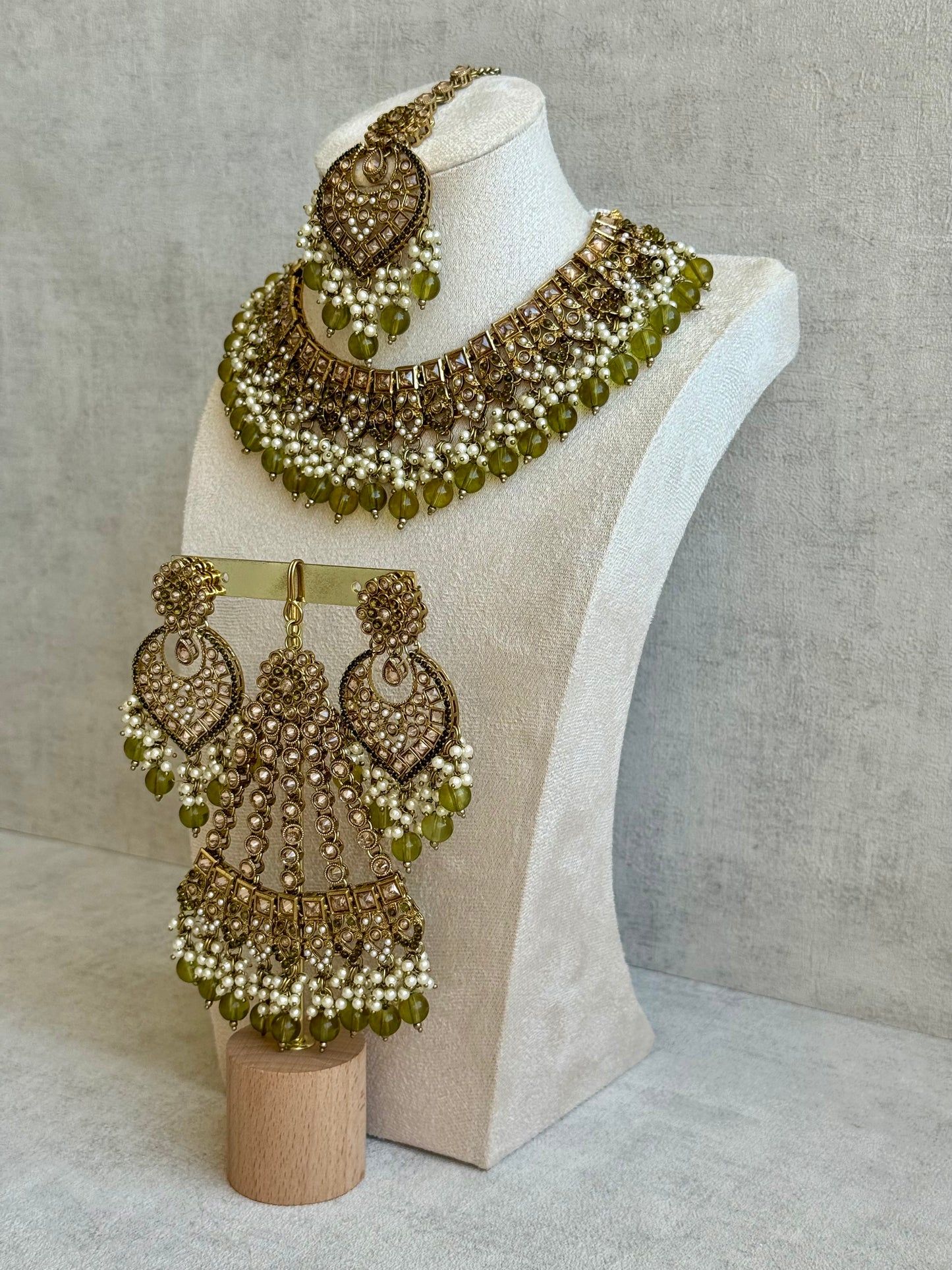 Ayura Designs Sabeen Set with Choker, Jhumkis, Tikka & Jhoomar – Champagne Kundan, Pearl Clusters & Olive Green Beads