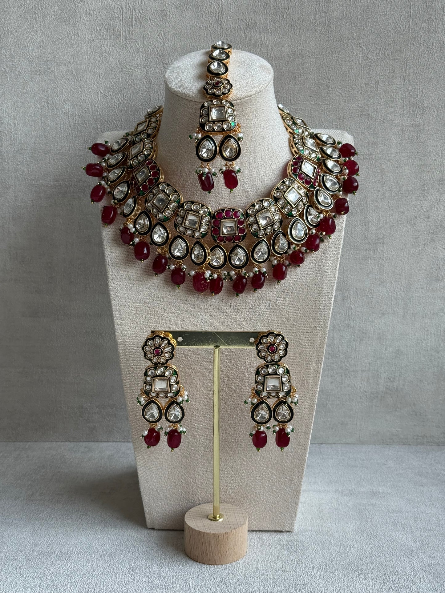 Ayura Designs Salma Set – Necklace, Earrings & Tikka with Mirror-Cut Kundan, Ruby Red Beads, Emerald Green Meenakari & Gold Finish
