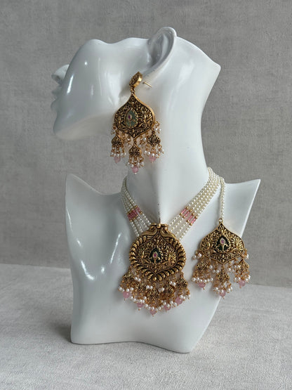 Ayura Designs Afia Necklace Set with Earrings & Tikka – Antique Gold, Blush Pink Pearls, Green Centre Stone & Peacock Motifs
