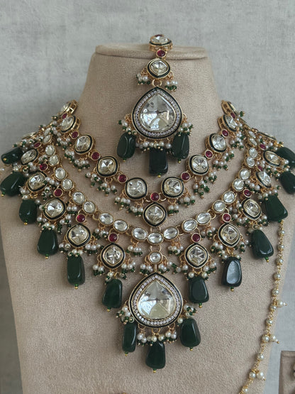 Ayura Designs Malika Bridal Set with Necklace, Jhumkis, Tikka, Nath, Ring & Sheeshphool – Jadau Kundan Craftsmanship with Mirror-Cut Polki, Emerald Green Drops, Ruby Accents & Antique Gold Finish
