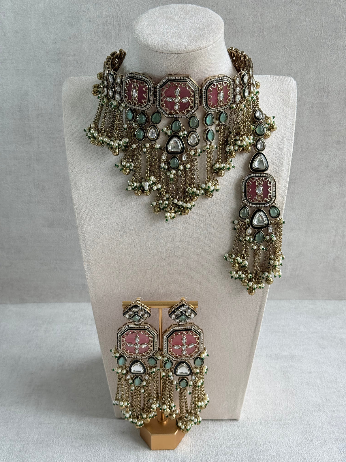 Ayura Designs Ashna Choker Set with Tikka and Earrings – Rose Pink, Mint Green & Kundan with Chains & Ghungroos in Antique Gold Finish