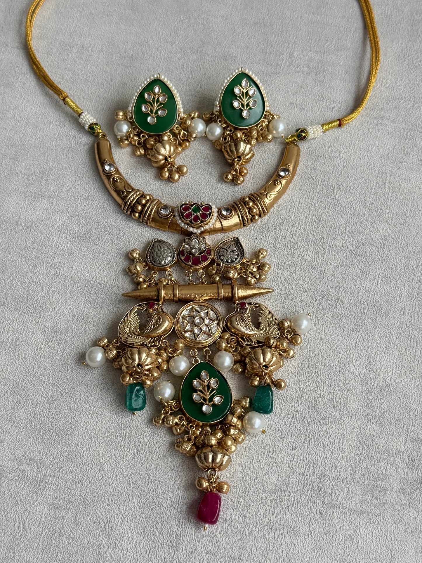 Ayura Designs Zaqsh Collar Necklace Set with Earrings – Antique Gold Peacock Pendant with Emerald Green Stones & Pearl Detailing