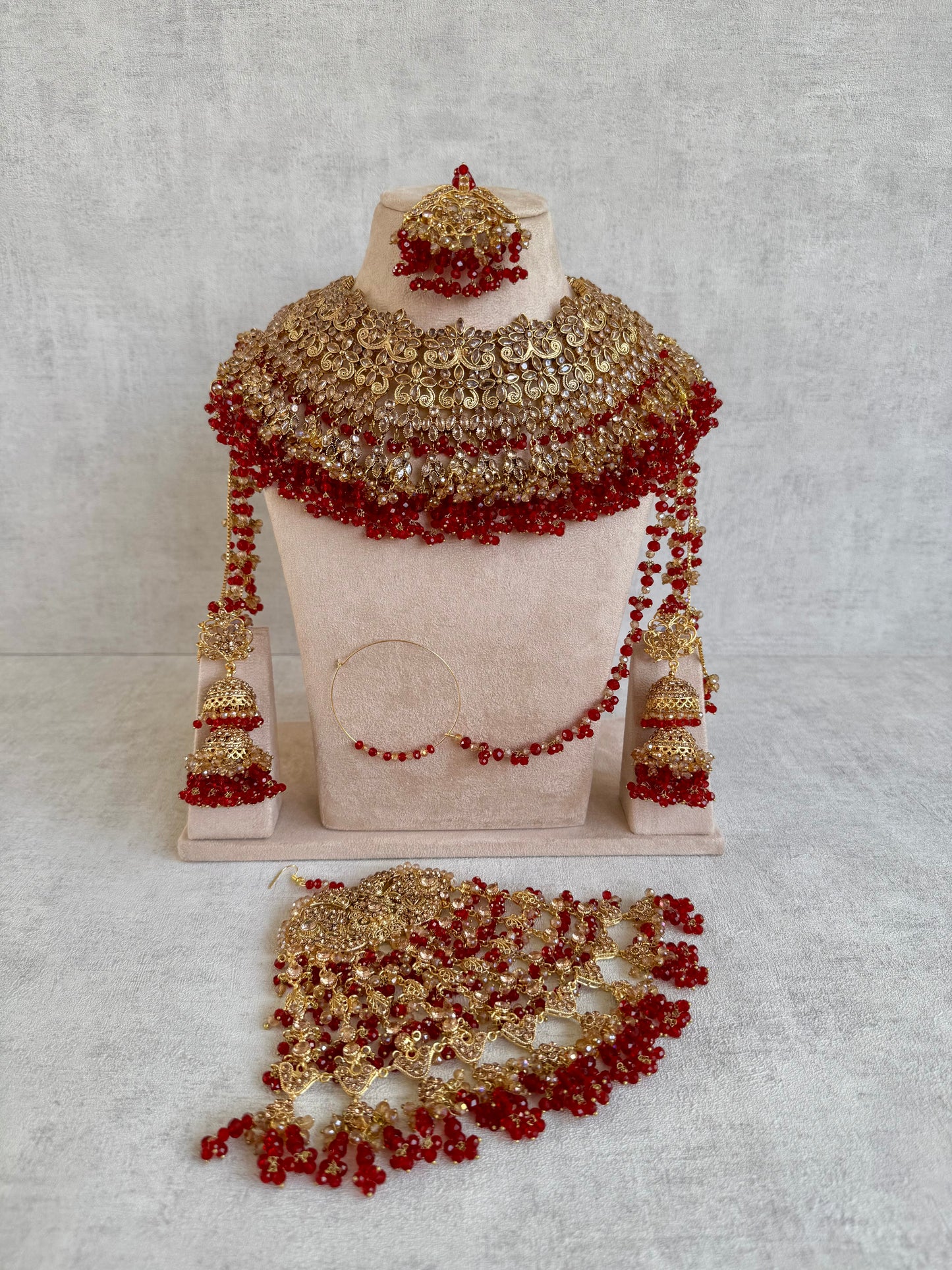 Ayura Designs Ishqiya Bridal Set with Necklace, Jhumkis with Sahare, Tikka & Jhoomer – Antique Gold, Champagne Stones & Red Bead Detailing
