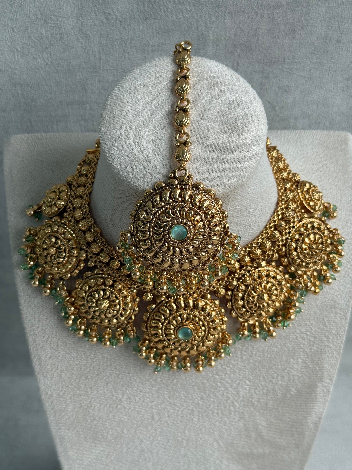 Ayura Designs Rummy Set – Statement Necklace, Earrings & Tikka with Pistachio Green Beads and Polished Gold Finish