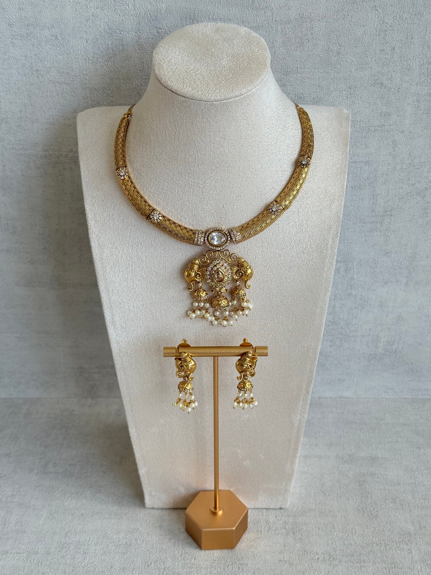 Ayura Designs Wadha Collar Necklace Set with Earrings – Gold Elephant Pendant & White Crystal Detailing