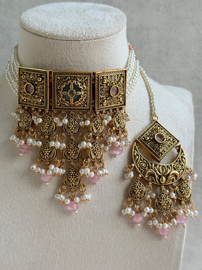 Ayura Designs Samera Choker Set with Earrings & Tikka – Blush Pink Beads, Pearl Detailing, Green Centre Stone, Floral Motifs & Antique Gold Finish