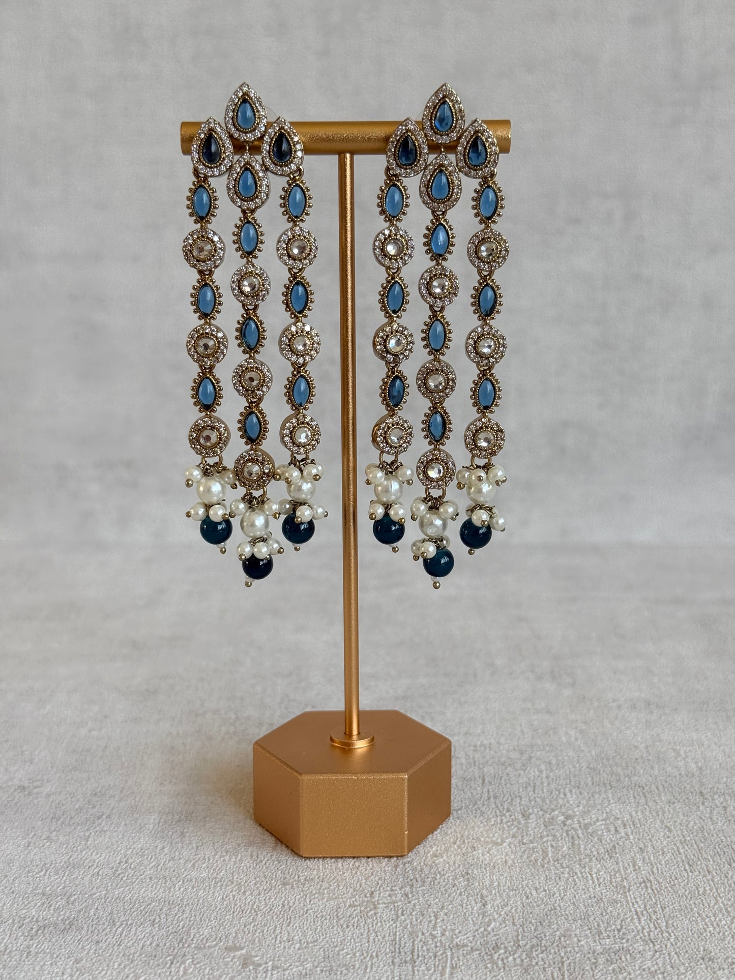 Ayura Designs Emilia Earrings – Gold Triple Strand Statement Earrings with Ink Blue Stones & Pearl Drops