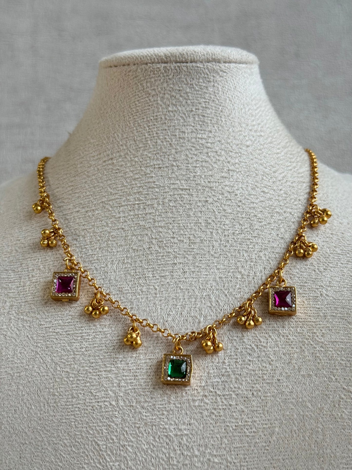 Ayura Designs Smita Set with Necklace & Earrings – Ruby Pink & Emerald Green Stones with Gold-Tone Ghungroo Detailing