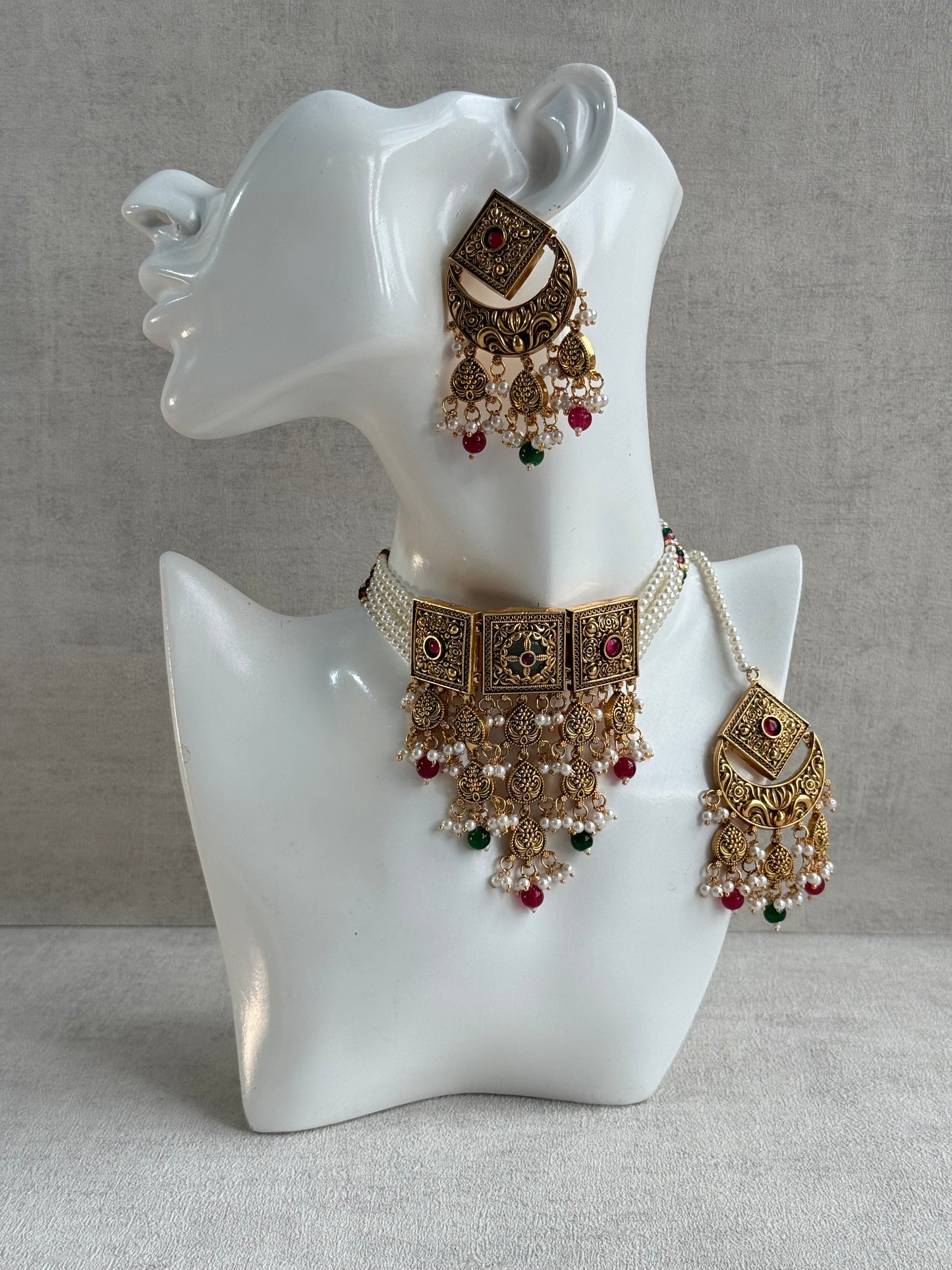 Ayura Designs Samera Choker Set with Earrings & Tikka – Rani Pink & Emerald Green Beads, Pearl Detailing, Green Centre Stone, Floral Motifs & Antique Gold Finish