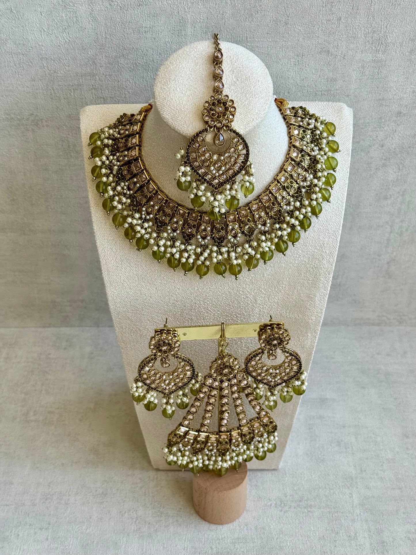 Ayura Designs Sabeen Set with Choker, Jhumkis, Tikka & Jhoomar – Champagne Kundan, Pearl Clusters & Olive Green Beads