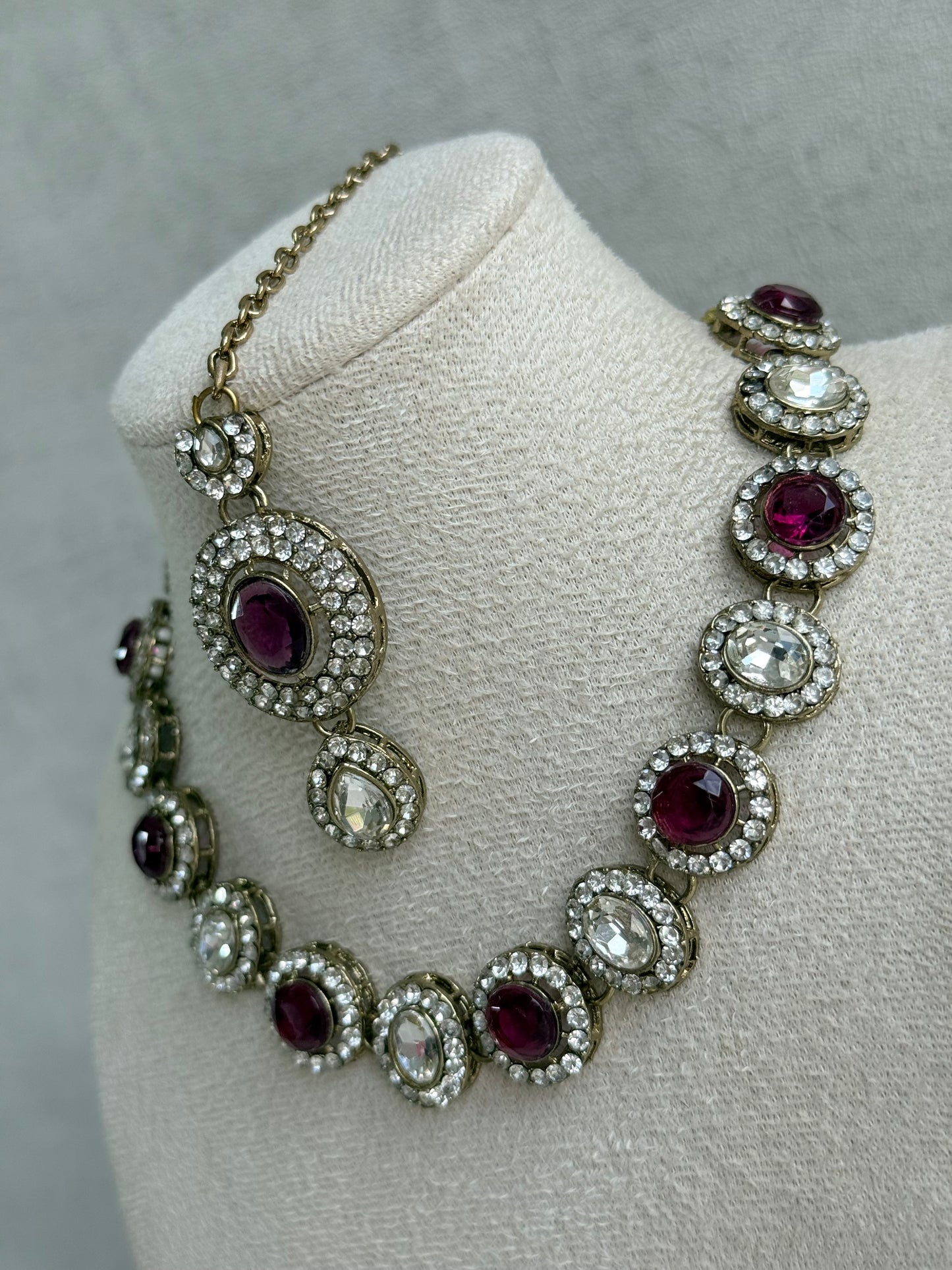 Ayura Designs Eira Necklace Set with Earrings & Tikka – Plum & Crystal Stones with Antique Gold Finish