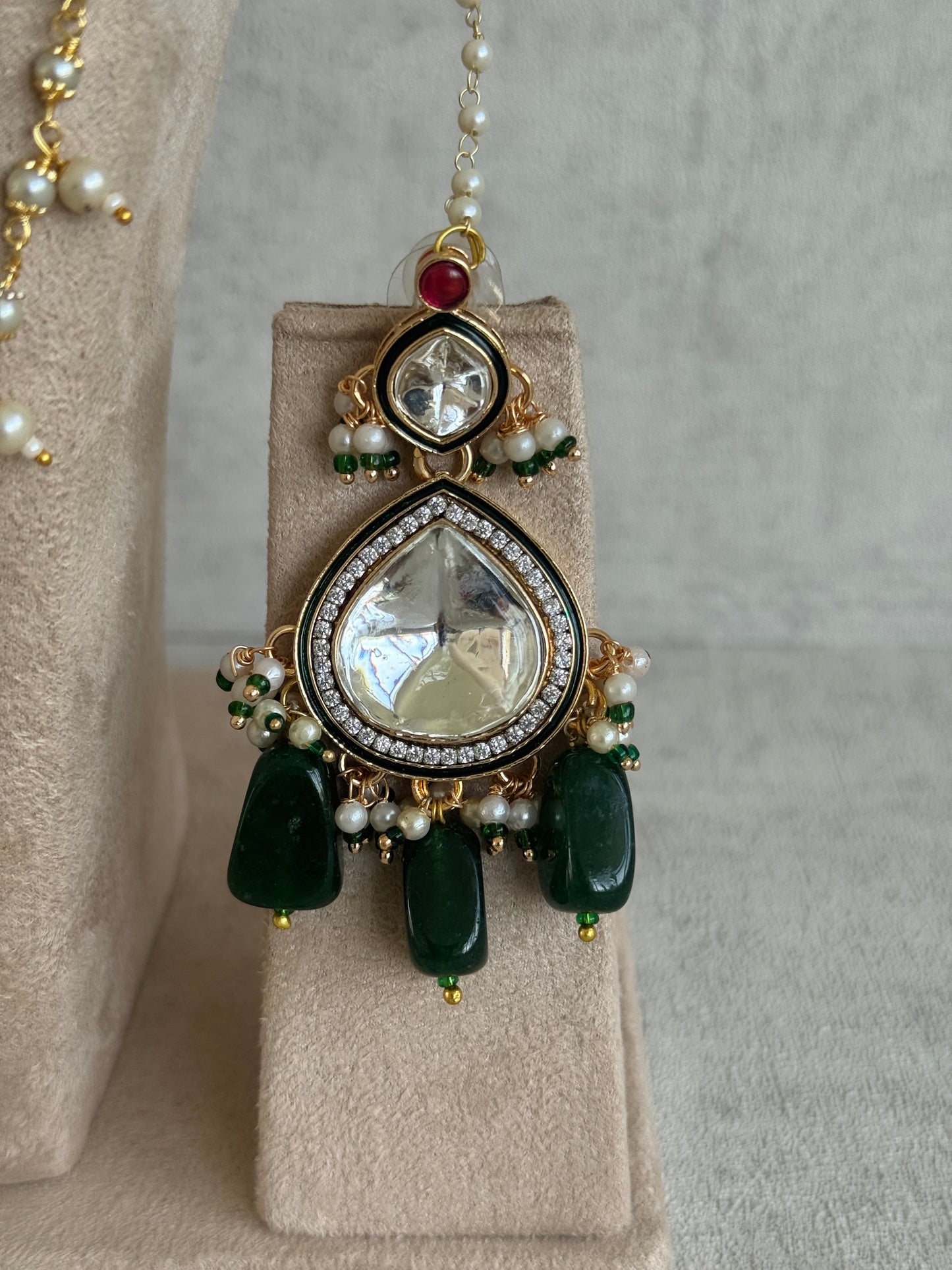 Ayura Designs Malika Bridal Set with Necklace, Jhumkis, Tikka, Nath, Ring & Sheeshphool – Jadau Kundan Craftsmanship with Mirror-Cut Polki, Emerald Green Drops, Ruby Accents & Antique Gold Finish