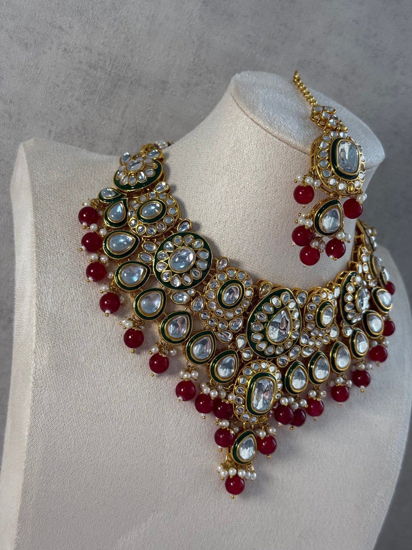 Ayura Designs Jashan Set with Necklace, Earrings, Tikka & Passa – Kundan Detailing, Pearl Drops & Ruby Red Beads