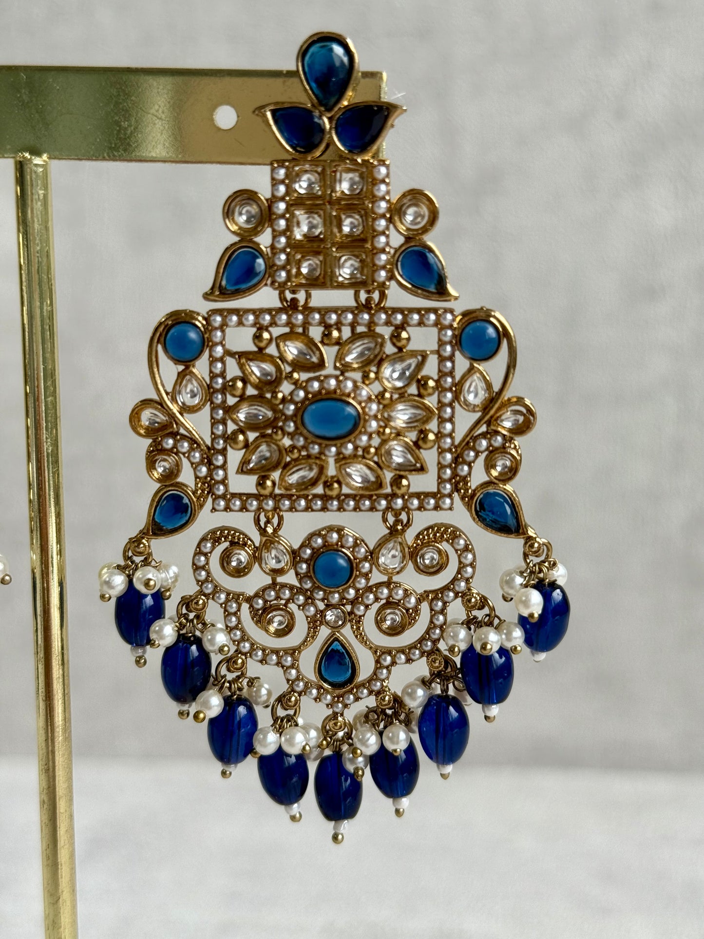 Ayura Designs Arwa Earrings – Antique Gold Finish with Midnight Blue Stones & Pearl Detailing