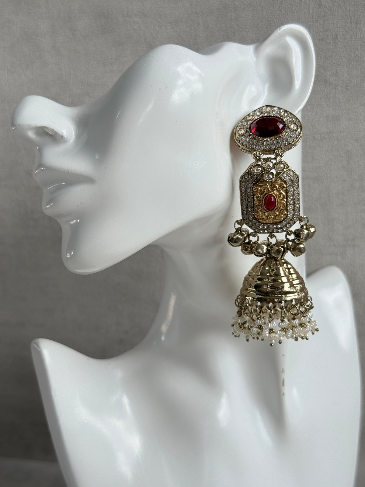 Ayura Designs Maara Jhumkis – Champagne Gold with Ruby Red Stones, Crystals, Ghungroos & Pearl Detailing