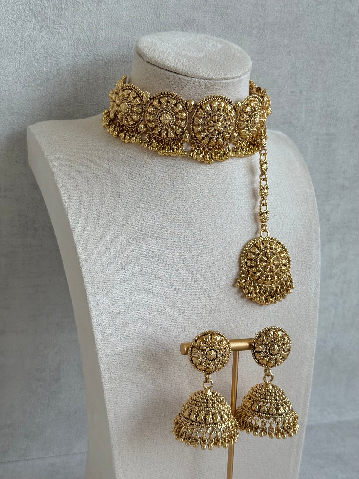 Ayura Designs Nawabi Choker Set with Jhumkis & Tikka – Traditional Gold Tone Bridal Choker with Floral Motifs & Ghungroo Detailing