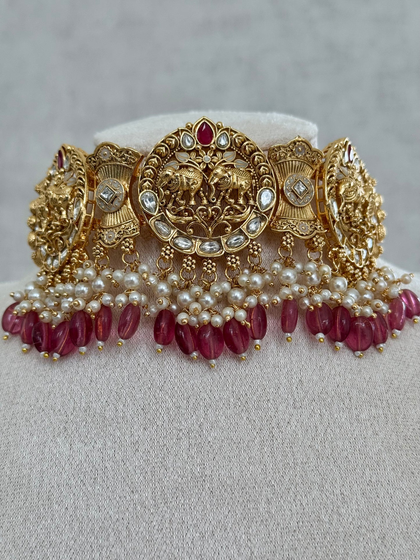 Ayura Designs Tanu Choker Set with Earrings & Tikka – A Golden Harmony of Pearls, Ruby Red Accents & Intricate Gold Detailing