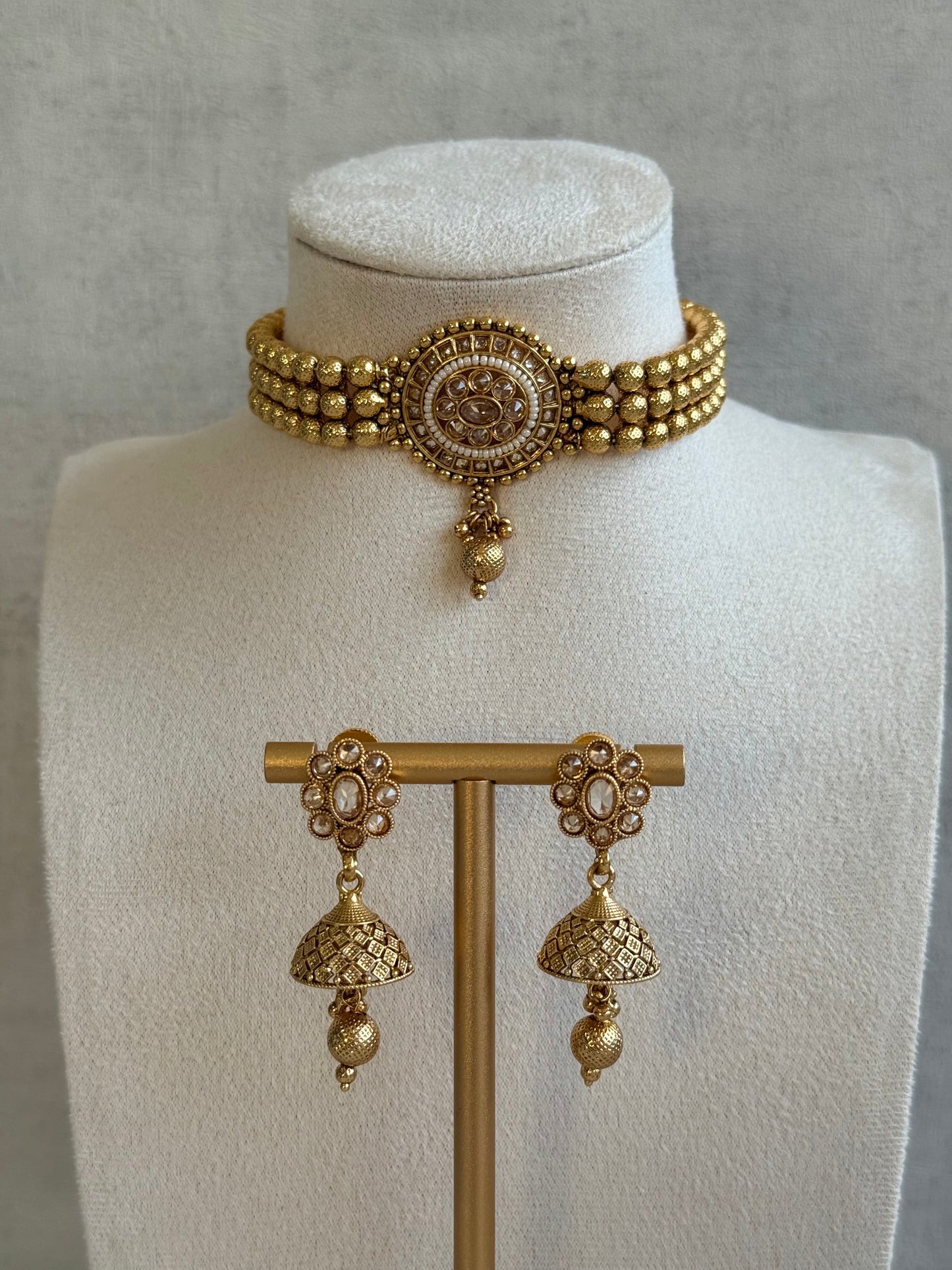 Ayura Designs Kavish Choker Set – Antique Gold Choker with Jhumkis in Champagne Stones & Pearl Detailing