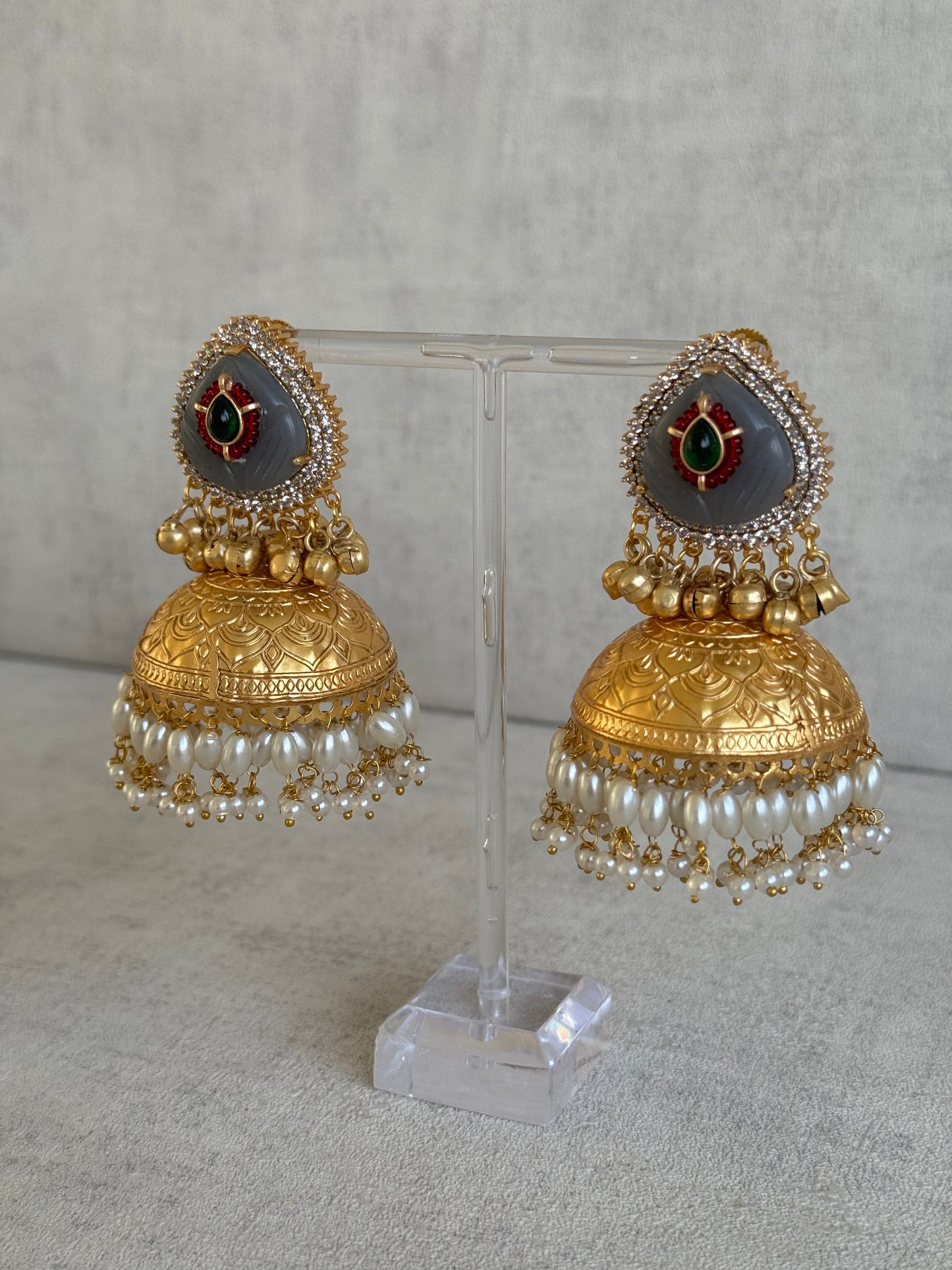 Ayura Designs Ziva Jhumkis – Handcrafted in Antique-Finish Brass with Grey Enamel Studs, Green Stone Detail & Pearl Clusters