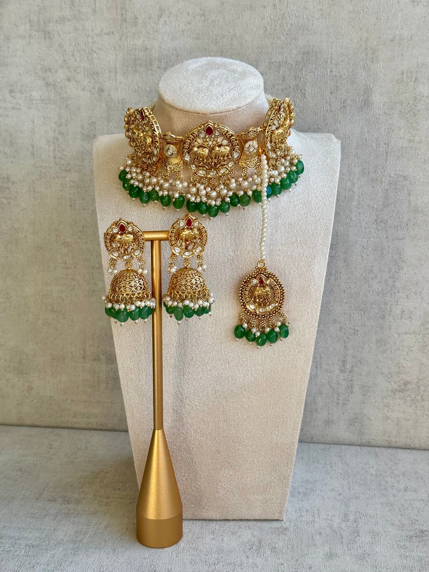 Ayura Designs Tanu Choker Set with Earrings & Tikka – A Golden Harmony of Pearls, Emerald Hues & Crimson Accents