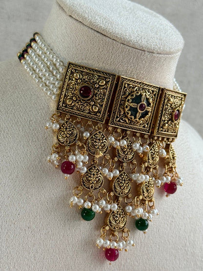 Ayura Designs Samera Choker Set with Earrings & Tikka – Rani Pink & Emerald Green Beads, Pearl Detailing, Green Centre Stone, Floral Motifs & Antique Gold Finish