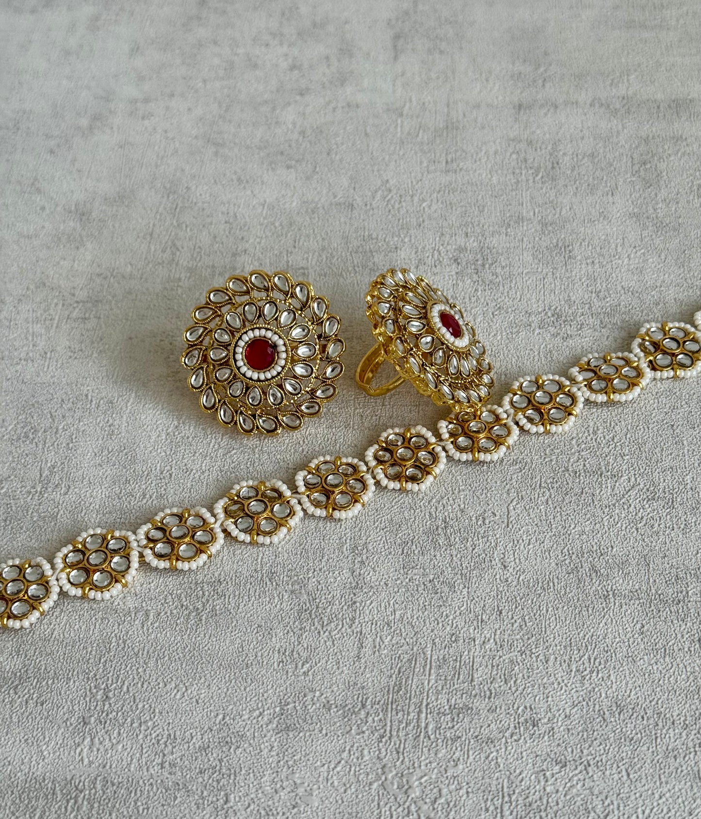 Ayura Designs Gulbahar Bridal Set with Necklace, Jhumkis, Tikka, Nath, Ring & Sheeshphool – Jadau Kundan Craftsmanship with Mirror-Cut Polki, Red Beads & Antique Gold Finish