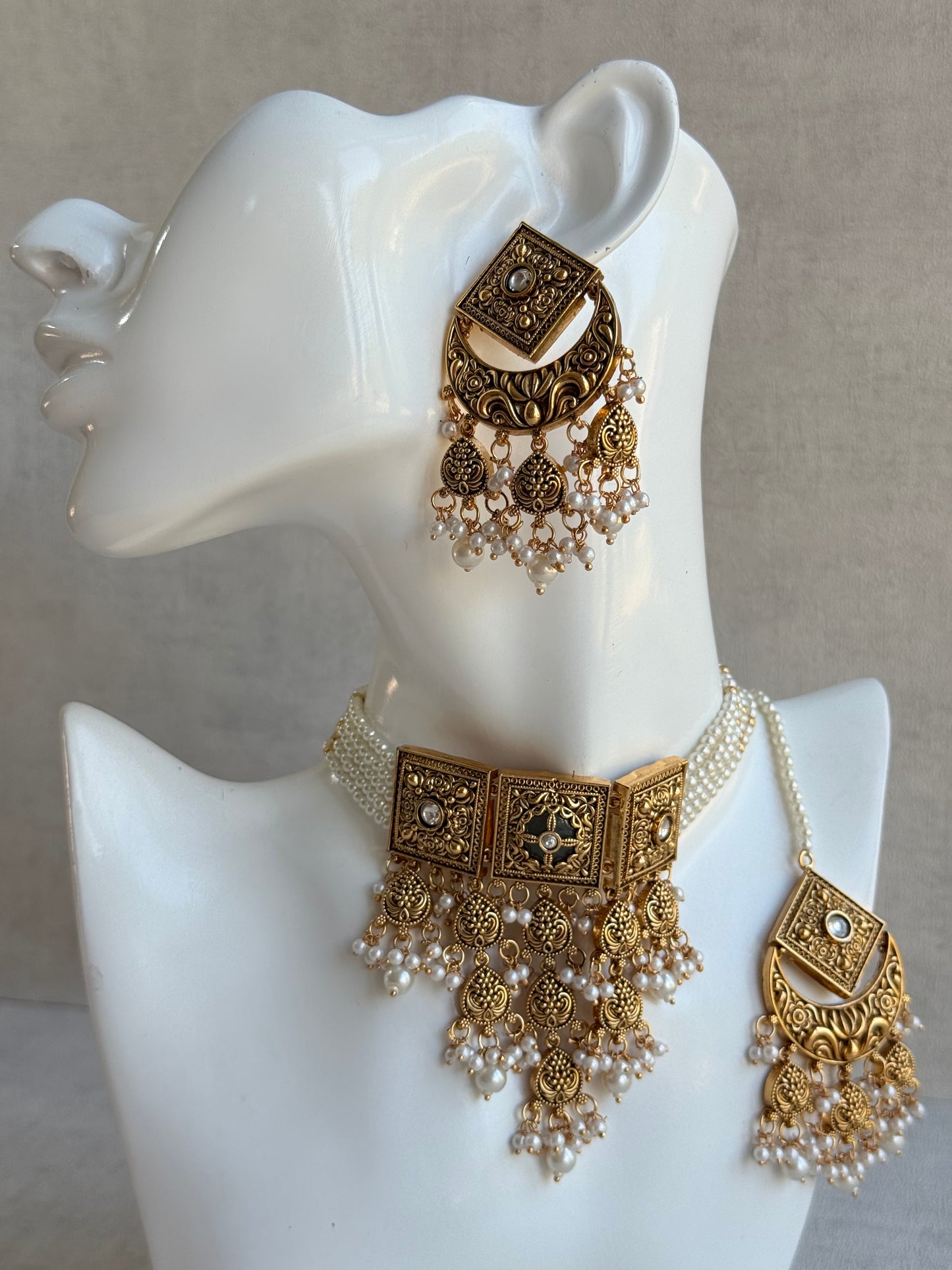 Ayura Designs Samera Choker Set with Earrings & Tikka – Ivory Beads, Pearl Detailing, Green Centre Stone, Floral Motifs & Antique Gold Finish
