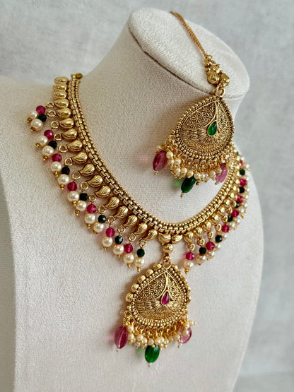 Ayura Designs Hamida Set with Necklace, Earrings & Tikka – Antique Gold with Ruby Pink and Emerald Green Beads & Pearl Detailing