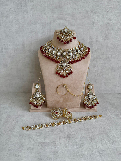 Ayura Designs Gulbahar Bridal Set with Necklace, Jhumkis, Tikka, Nath, Ring & Sheeshphool – Jadau Kundan Craftsmanship with Mirror-Cut Polki, Red Beads & Antique Gold Finish