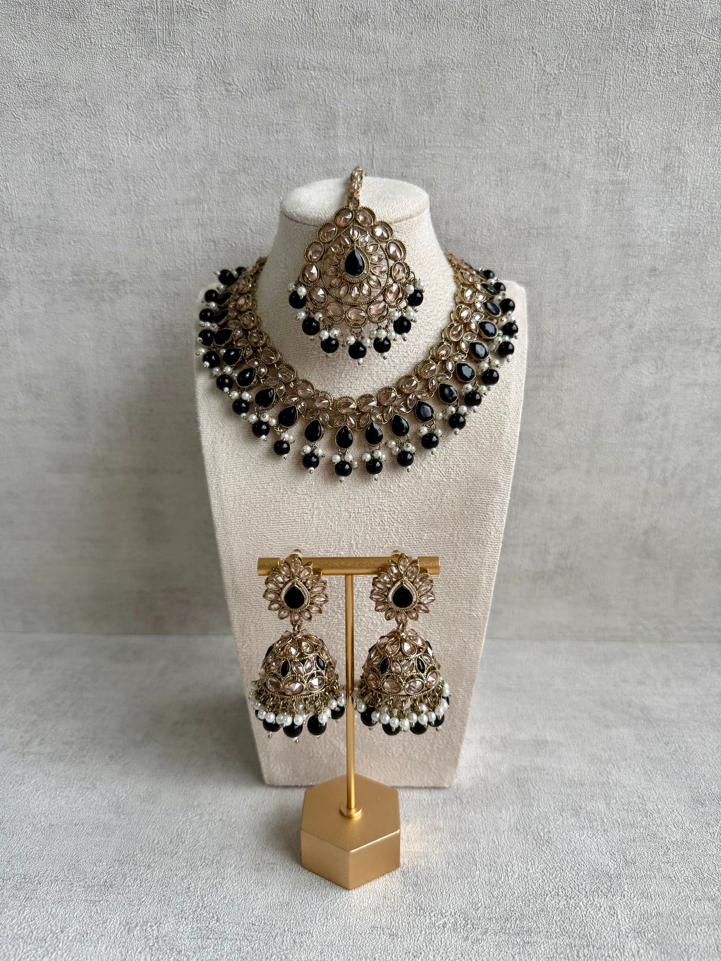 Ayura Designs Emaan Set with Jhumkis & Tikka – Black Beads, Mirror-Cut Stones & Antique Gold Finish