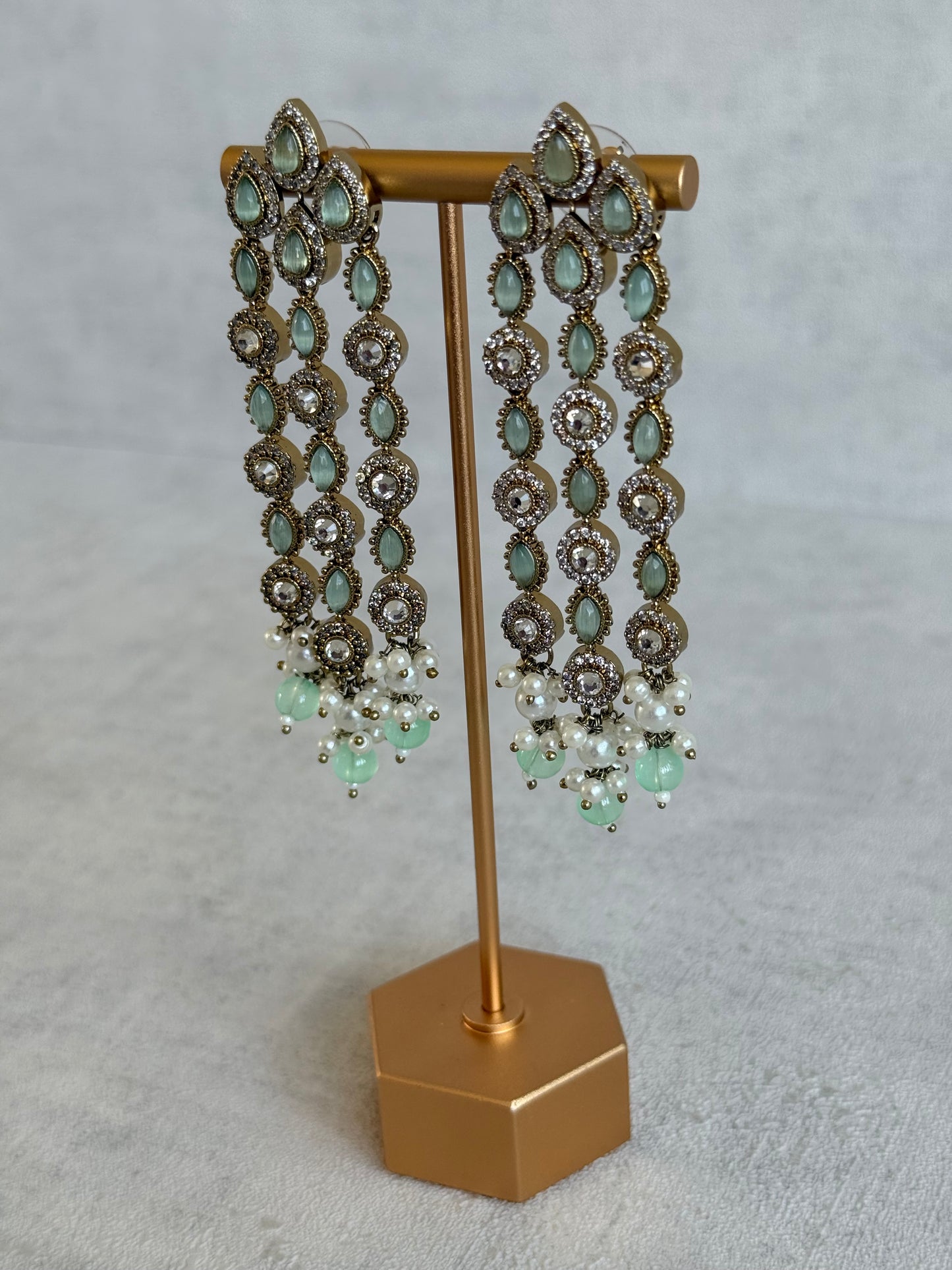 Ayura Designs Emilia Earrings – Gold Triple Strand Statement Earrings with Mint Green Stones & Pearl Drops