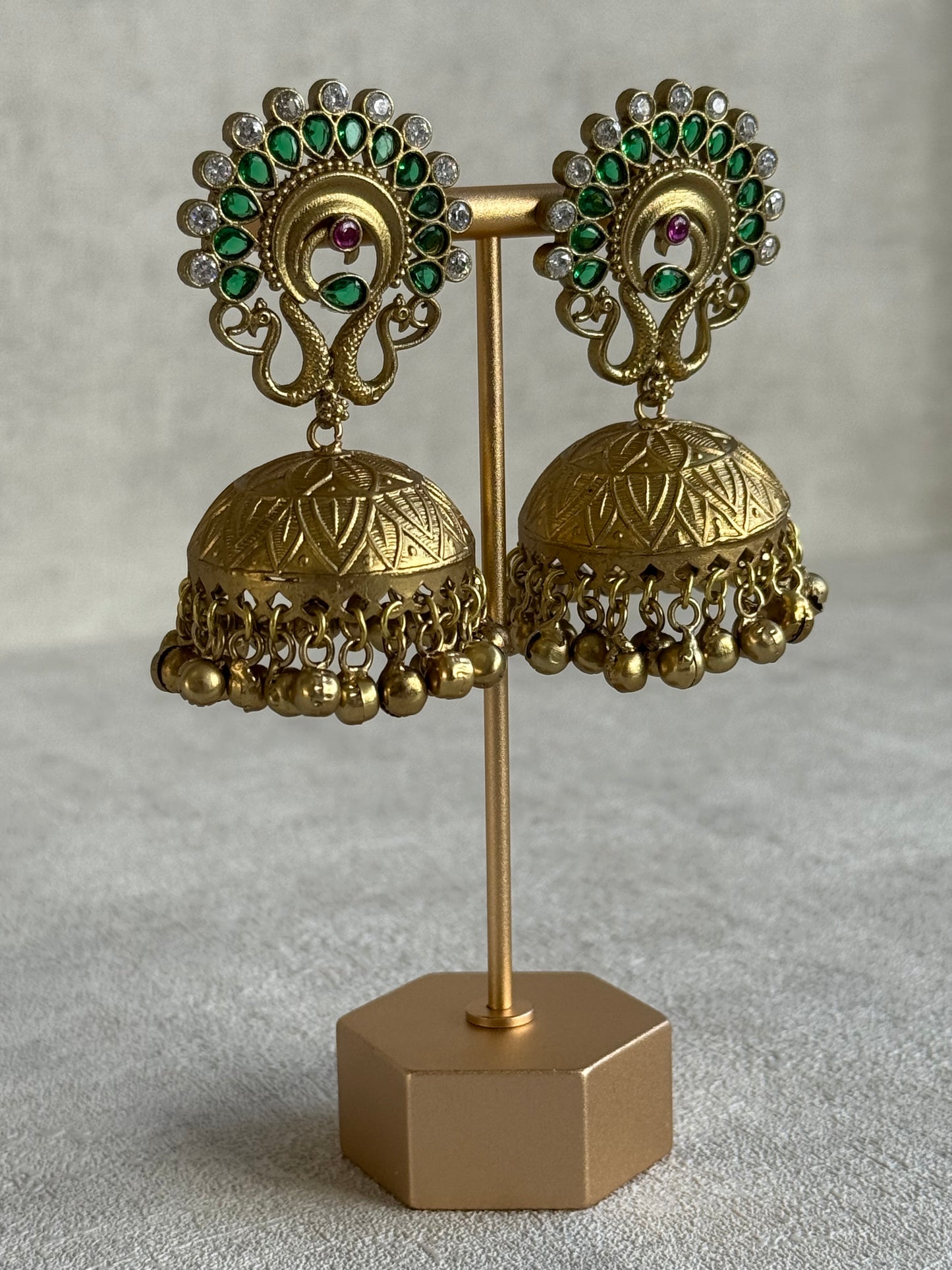Ayura Designs Moraya Jhumkis – Emerald Green Peacock Motif with Antique Gold Detailing