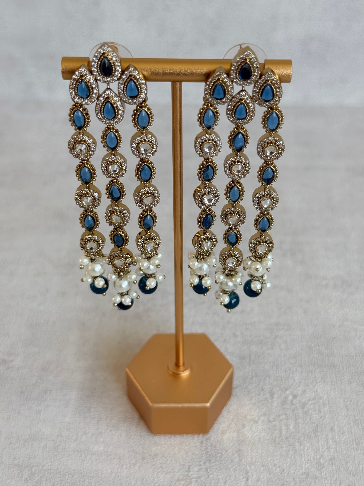 Ayura Designs Emilia Earrings – Gold Triple Strand Statement Earrings with Ink Blue Stones & Pearl Drops