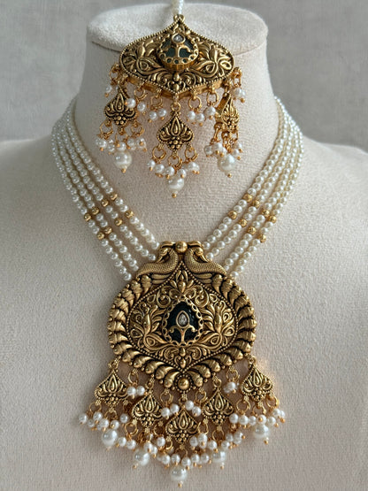 Ayura Designs Afia Necklace Set with Earrings & Tikka – Antique Gold, Ivory Pearls, Green Centre Stone & Peacock Motifs