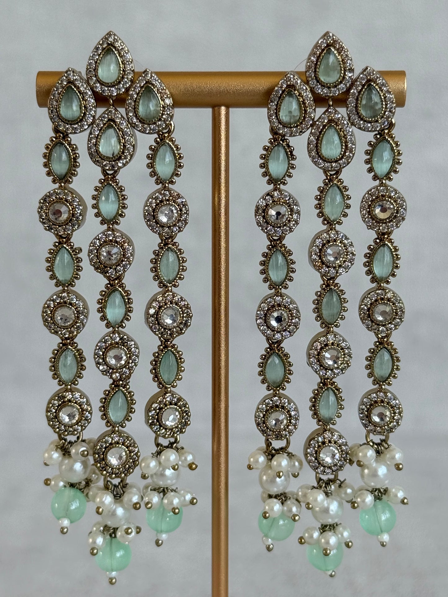 Ayura Designs Emilia Earrings – Gold Triple Strand Statement Earrings with Mint Green Stones & Pearl Drops