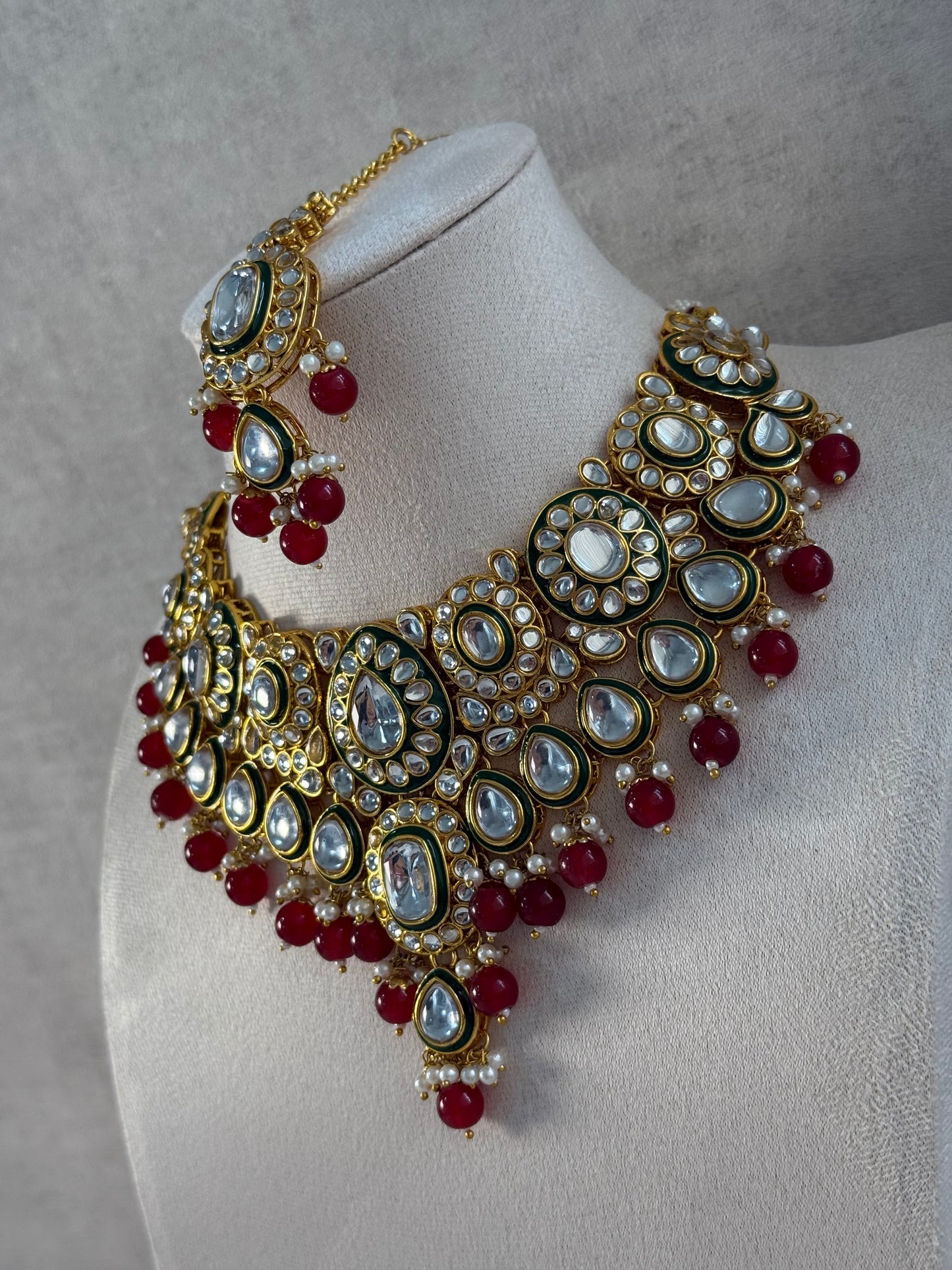 Ayura Designs Jashan Set with Necklace, Earrings, Tikka & Passa – Kundan Detailing, Pearl Drops & Ruby Red Beads