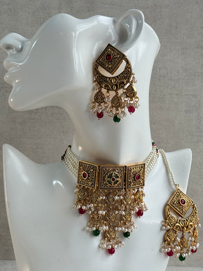 Ayura Designs Samera Choker Set with Earrings & Tikka – Rani Pink & Emerald Green Beads, Pearl Detailing, Green Centre Stone, Floral Motifs & Antique Gold Finish