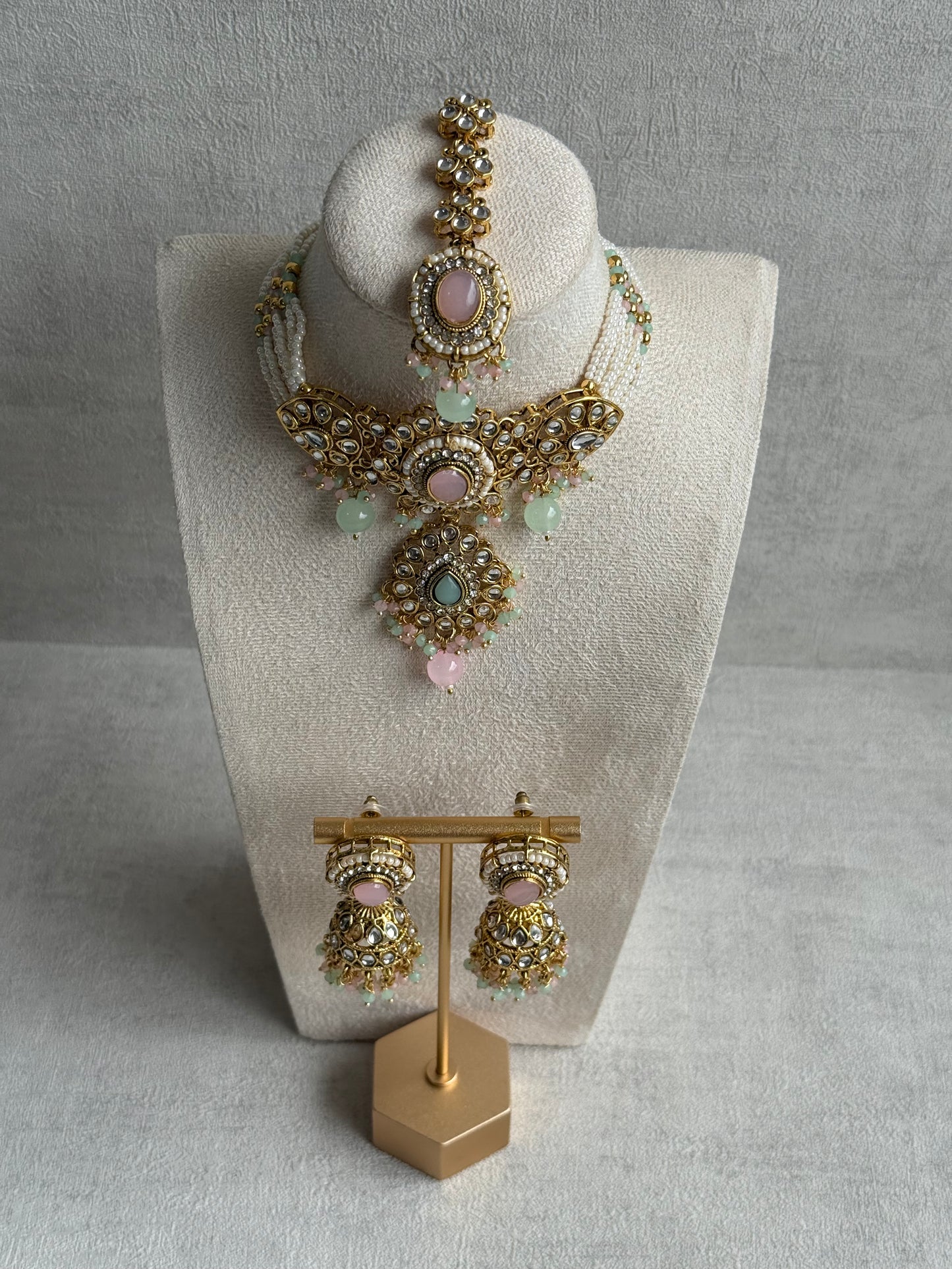 Ayura Designs Muskaan Set – Choker, Jhumkis & Tikka with Blush Pink & Mint Beads, Kundan Stones & Antique Gold Finish