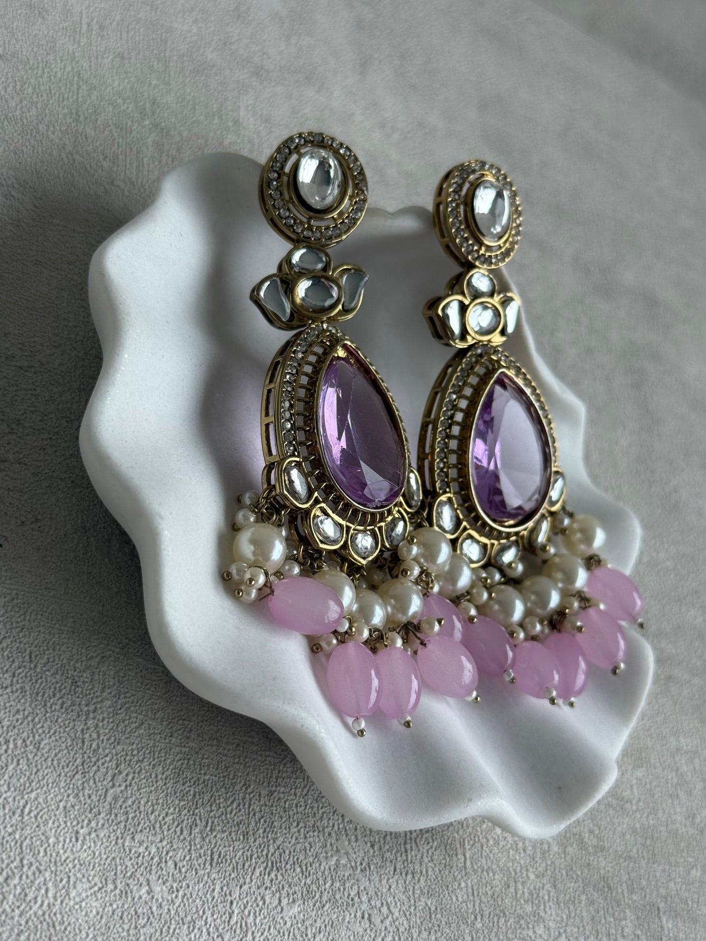 Ayura Designs Nageen Earrings – Antique Gold Jhumkis with Lilac Stones, Mirror-Cut Accents & Pearl Drops