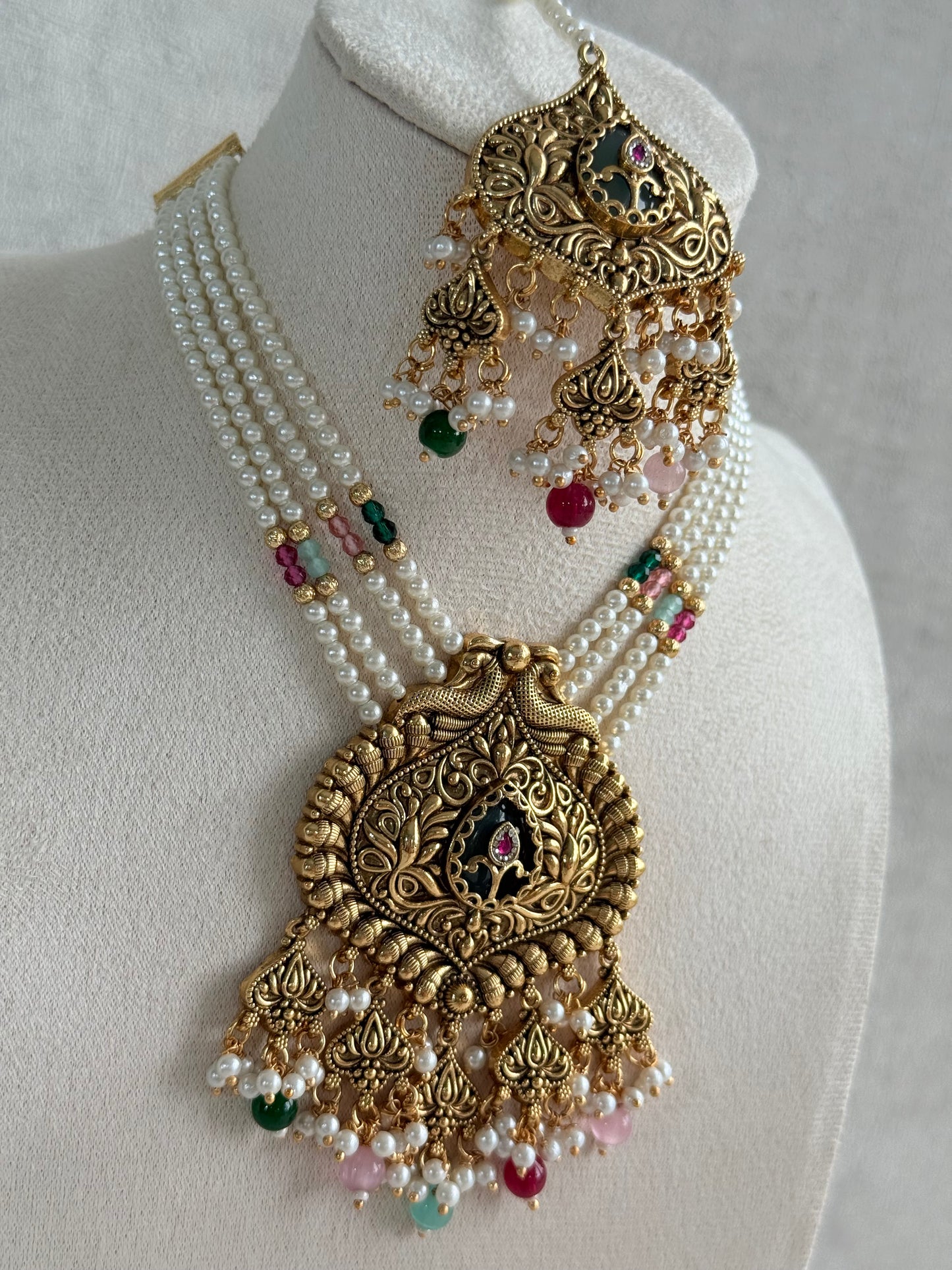 Ayura Designs Afia Necklace Set with Earrings & Tikka – Antique Gold, Multicolour Beads, Green Centre Stone & Peacock Motifs