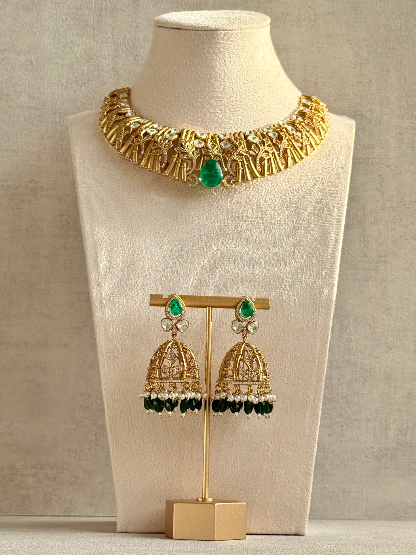Ayura Designs Rami Collar Set with Jhumkis – Sculpted Gold Collar with Emerald Green Stone and Crystal Detailing